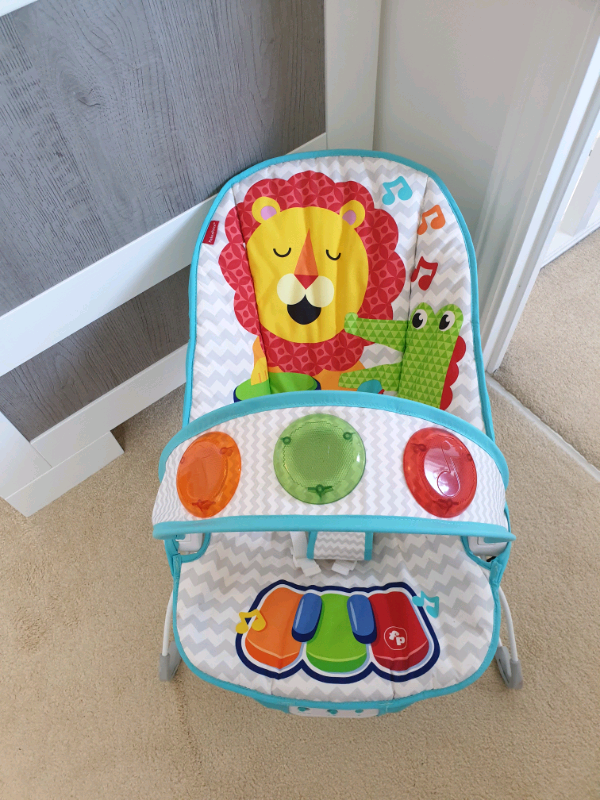 kick and play musical bouncer